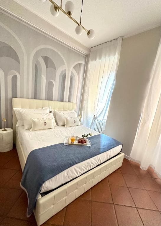 Main Bedroom with Arched Accent Wall