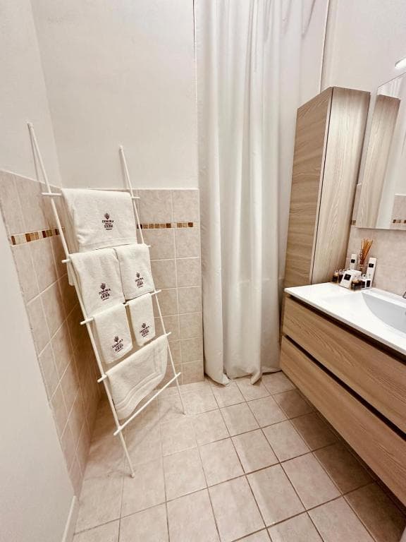 Modern Bathroom with Ladder Towel Rack