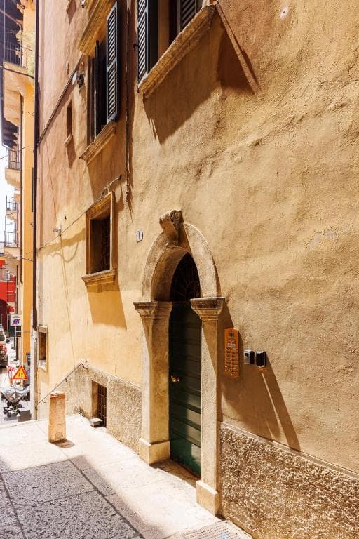 Charming Street **Entrance** & Stone Archway